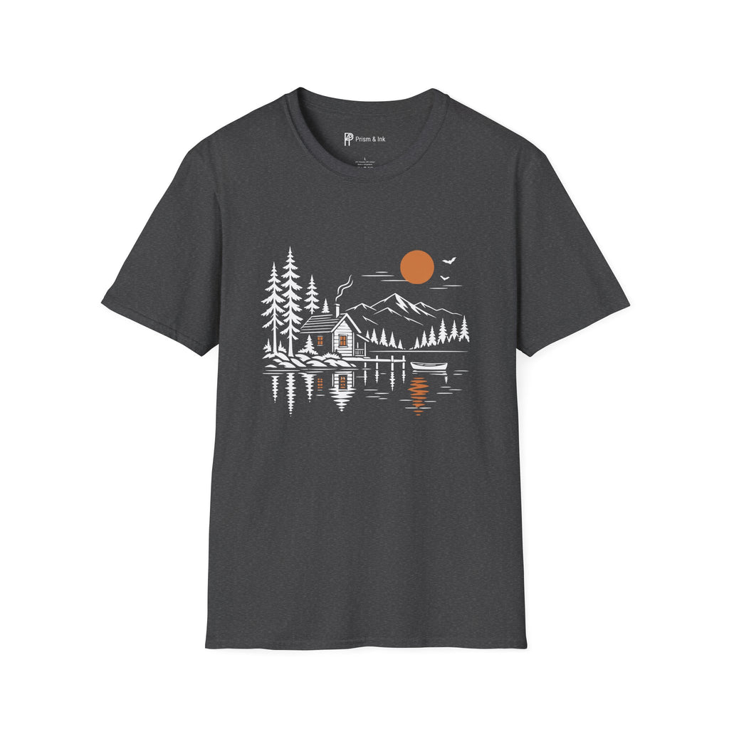A dark gray crewneck t-shirt featuring a minimalist graphic print of a cabin, mountains, pine trees, and an orange sun reflecting on water, shown against a plain white background.