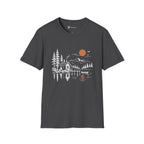 A dark gray crewneck t-shirt featuring a minimalist graphic print of a cabin, mountains, pine trees, and an orange sun reflecting on water, shown against a plain white background.